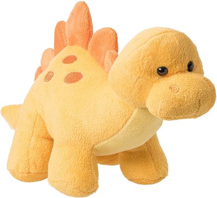 Jouet vert de peluche de tyrannosaure avec de longues dents aiguës un jouet de peluche de dinosaure fait de peluche de cisaillement de relief