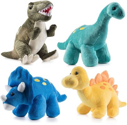 Jouet vert de peluche de tyrannosaure avec de longues dents aiguës un jouet de peluche de dinosaure fait de peluche de cisaillement de relief