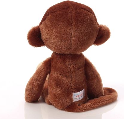 Peluche se reposante Toy With Big Ears de singe de Brown de longue queue