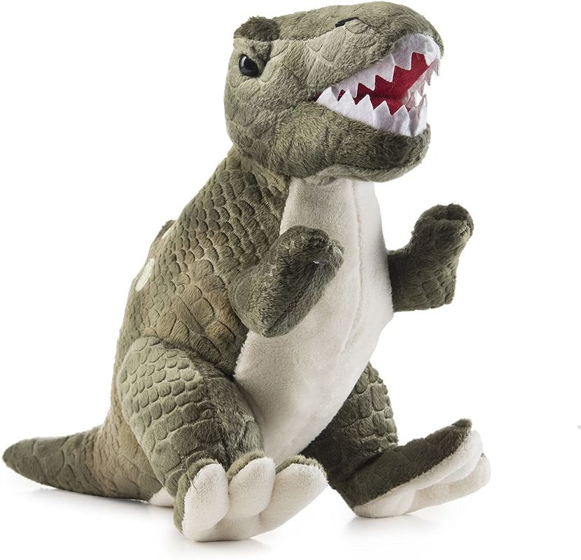 Jouet vert de peluche de tyrannosaure avec de longues dents aiguës un jouet de peluche de dinosaure fait de peluche de cisaillement de relief